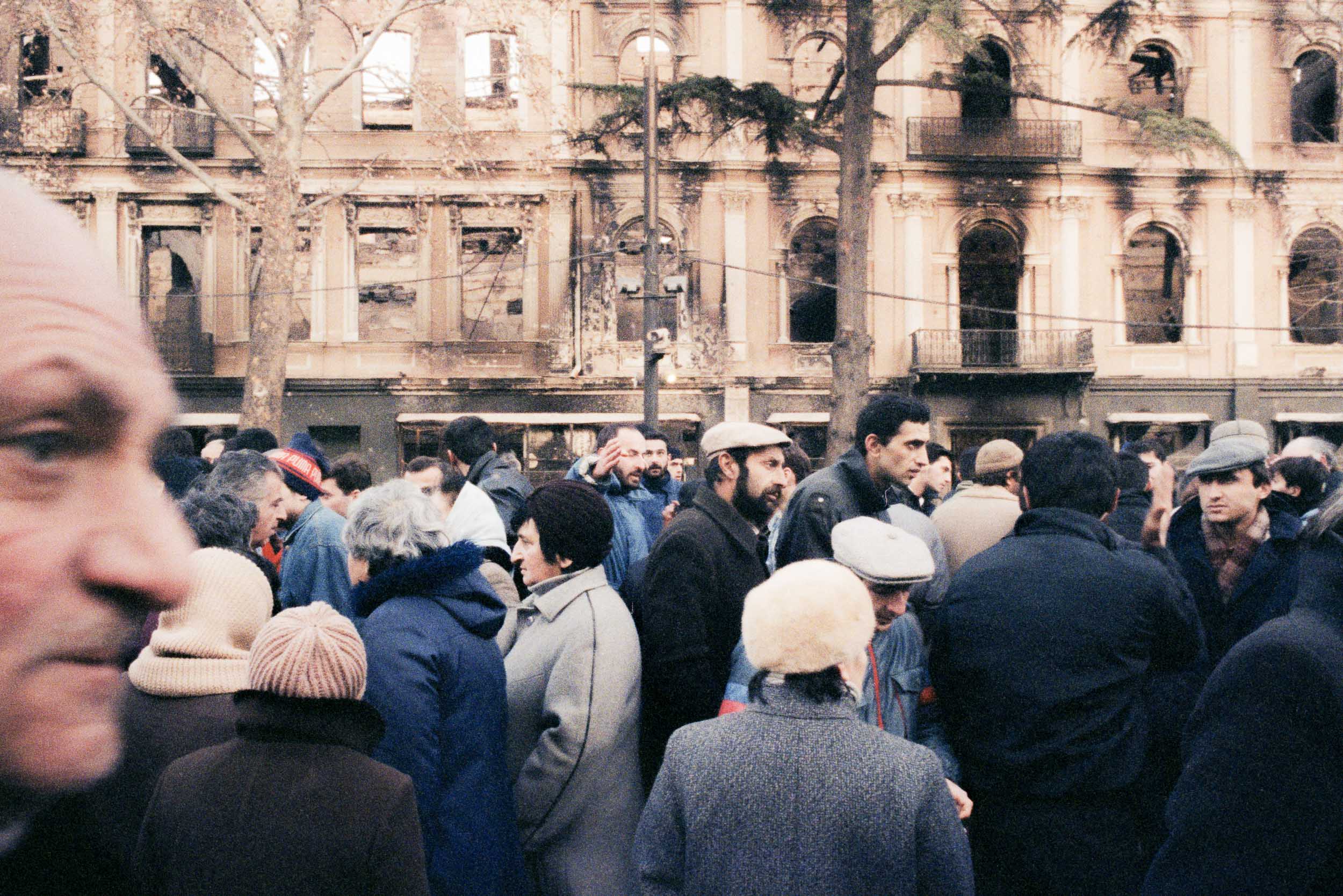 People engage in discussions on Rustaveli Avenue, in downtown Tbilisi, Georgia
