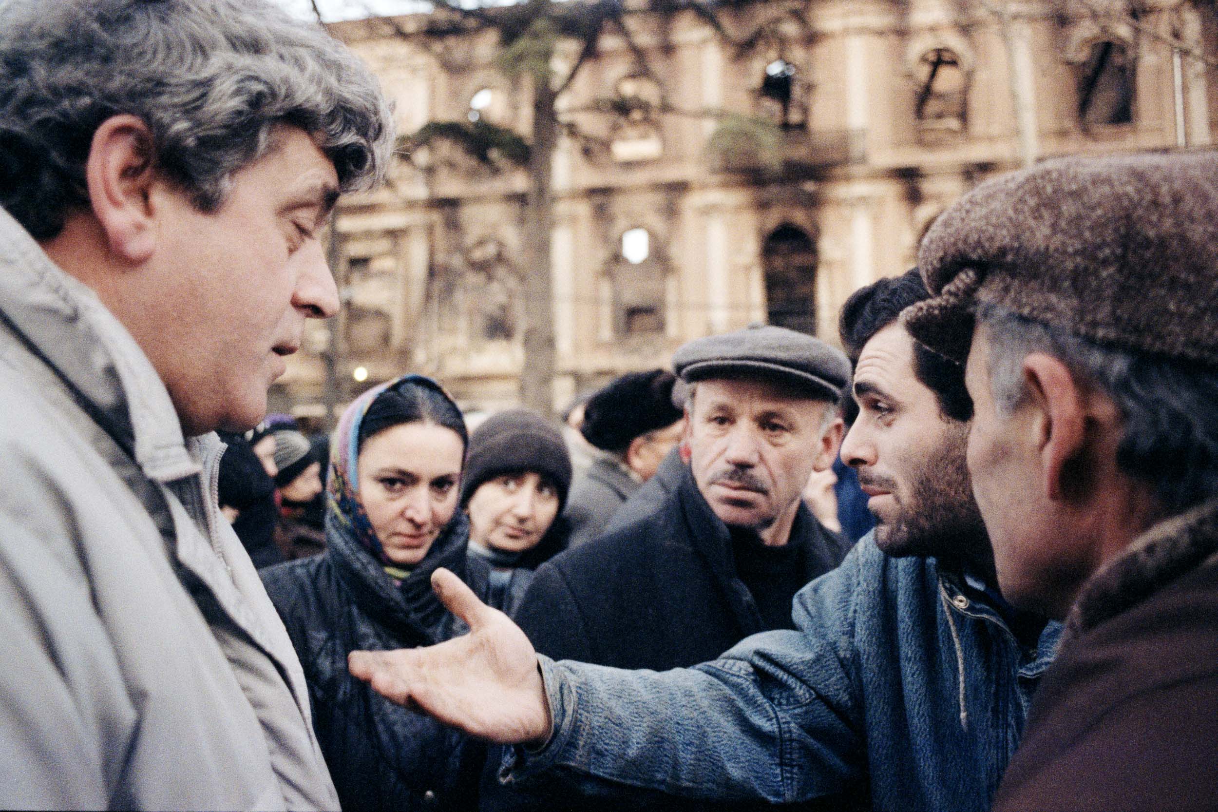 People engage in  discussions on Rustaveli Avenue in downtown Tbilisi, Georgia
