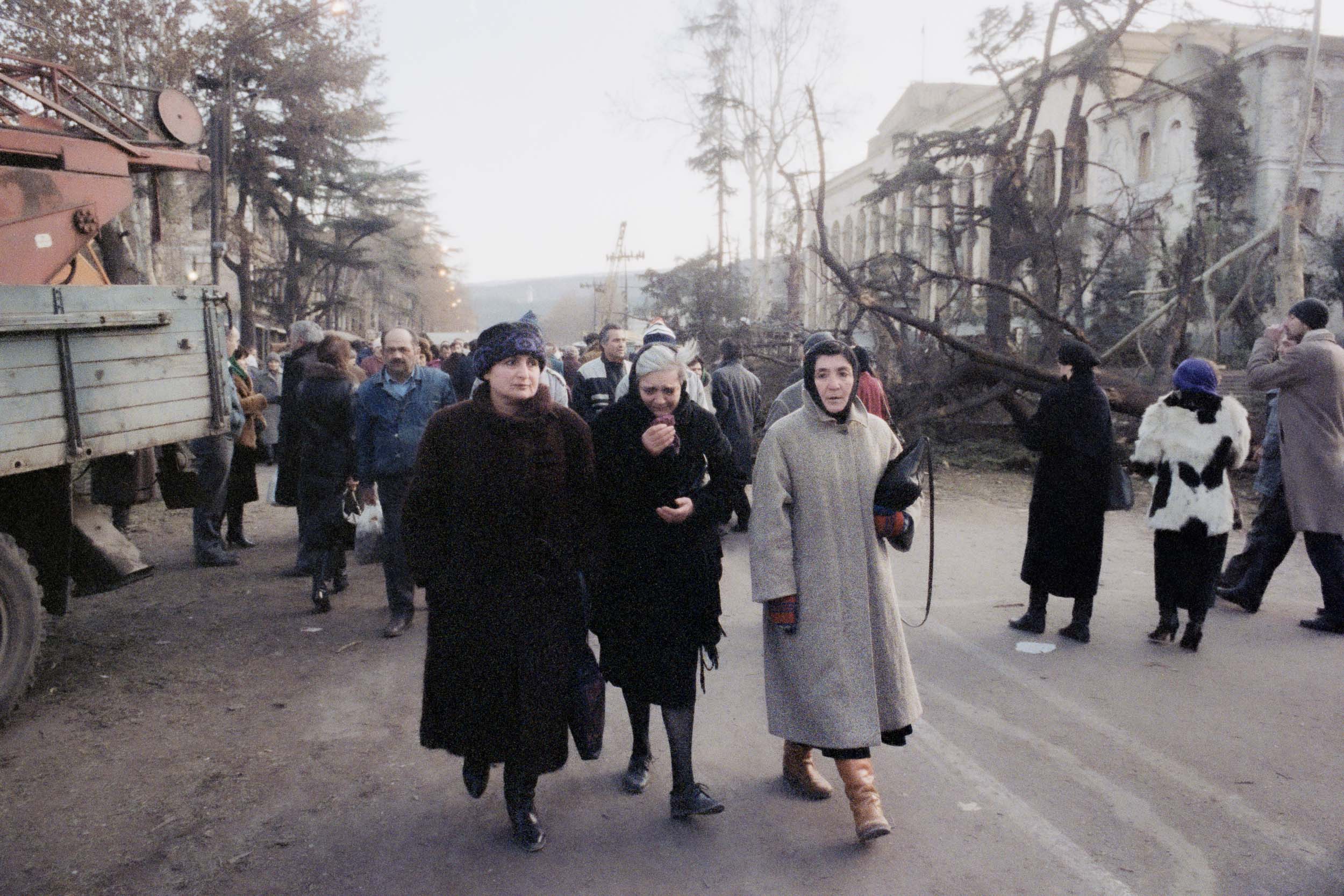 People come out to view the damage in downtown Tbilisi, Georgia