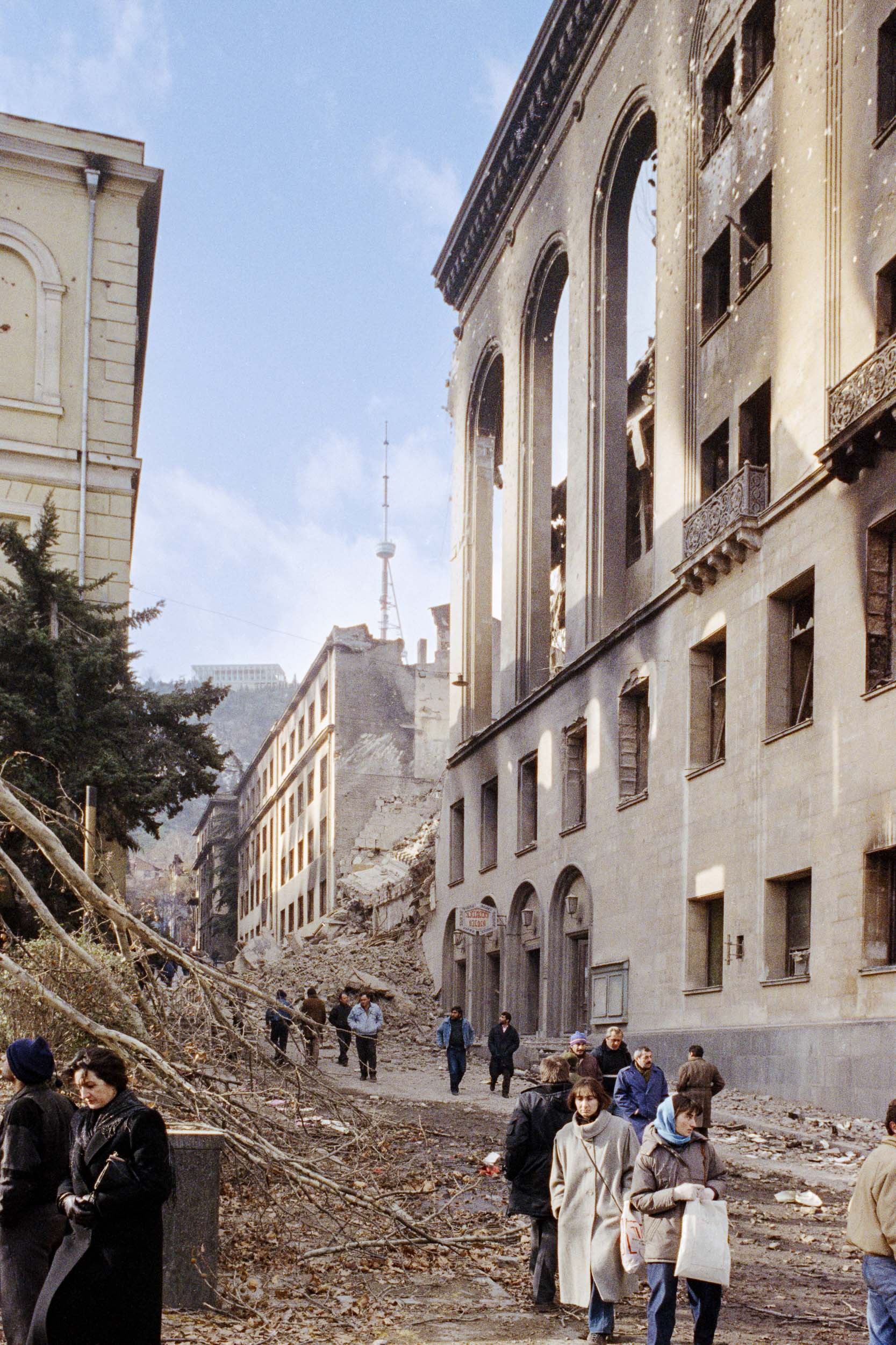 People come out to view the damage in downtown Tbilisi, Georgia