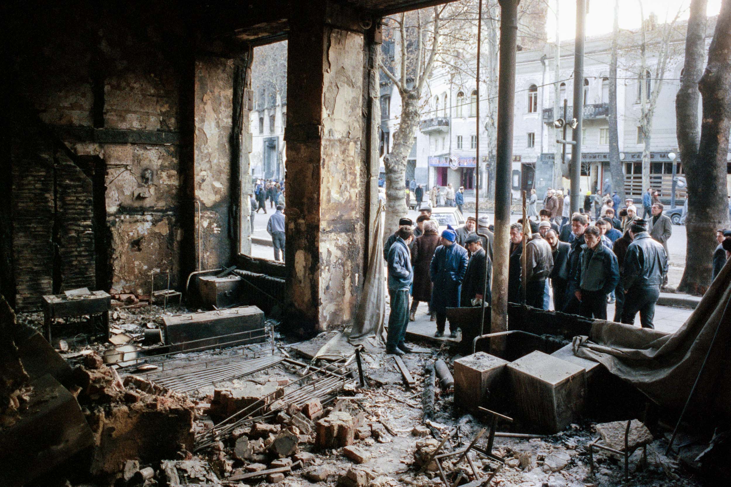 People come out to view the damage in downtown Tbilisi, Georgia