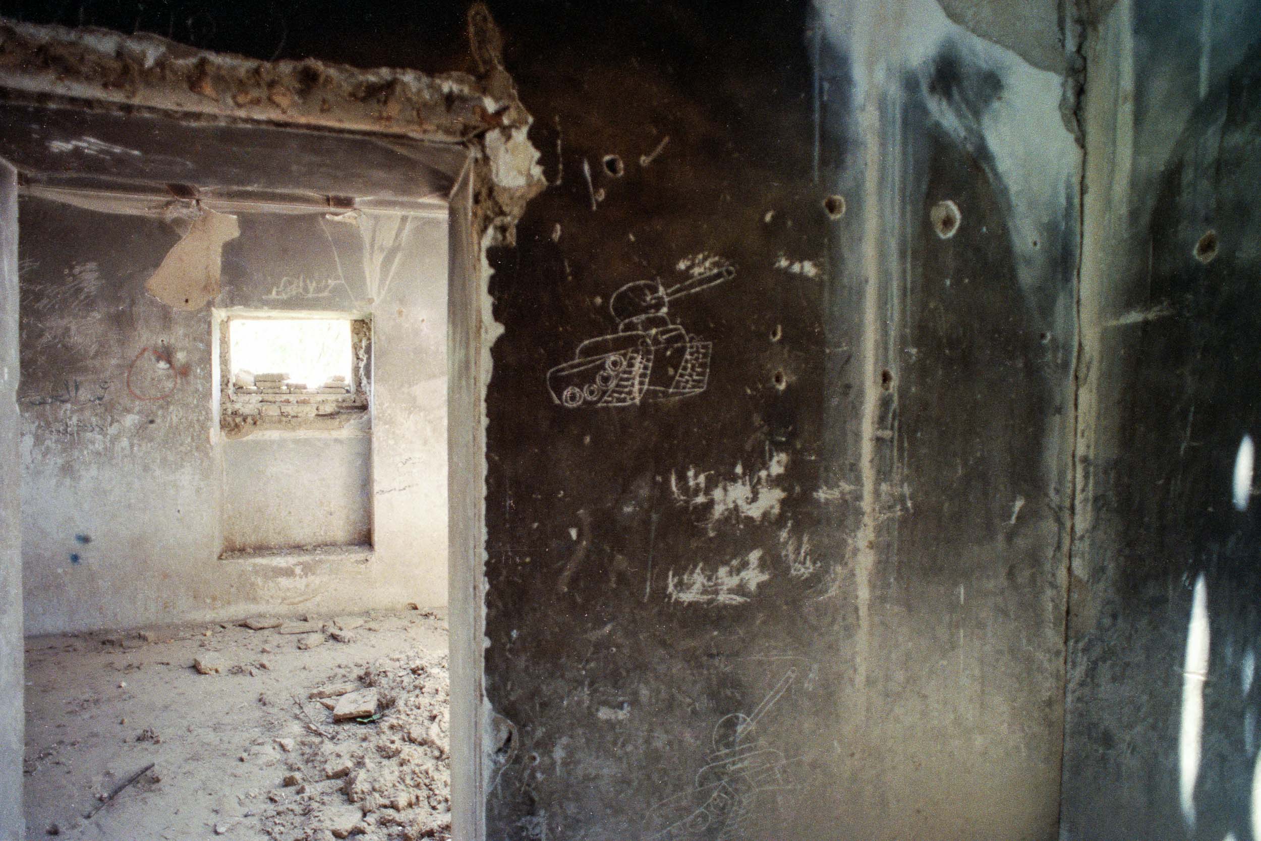 Mujahideen inspect Ruins after a battle, Afghanistan 1988 