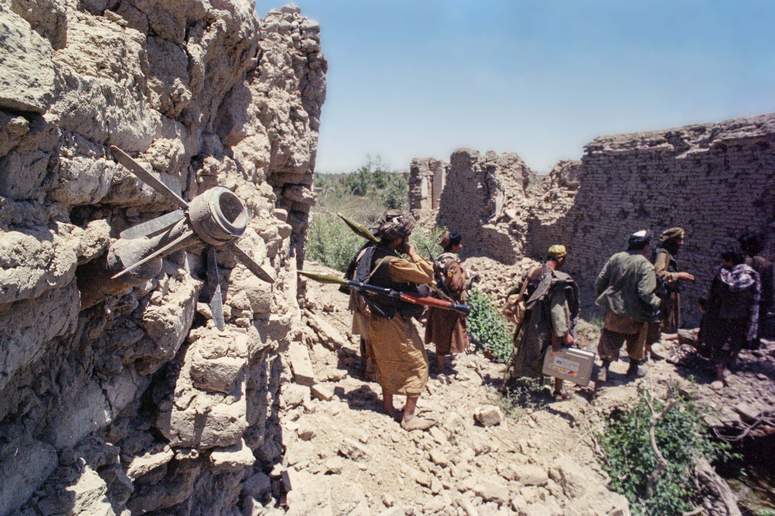 Mujahideen march through suburbs of Kandahar, Afghanistan 1988