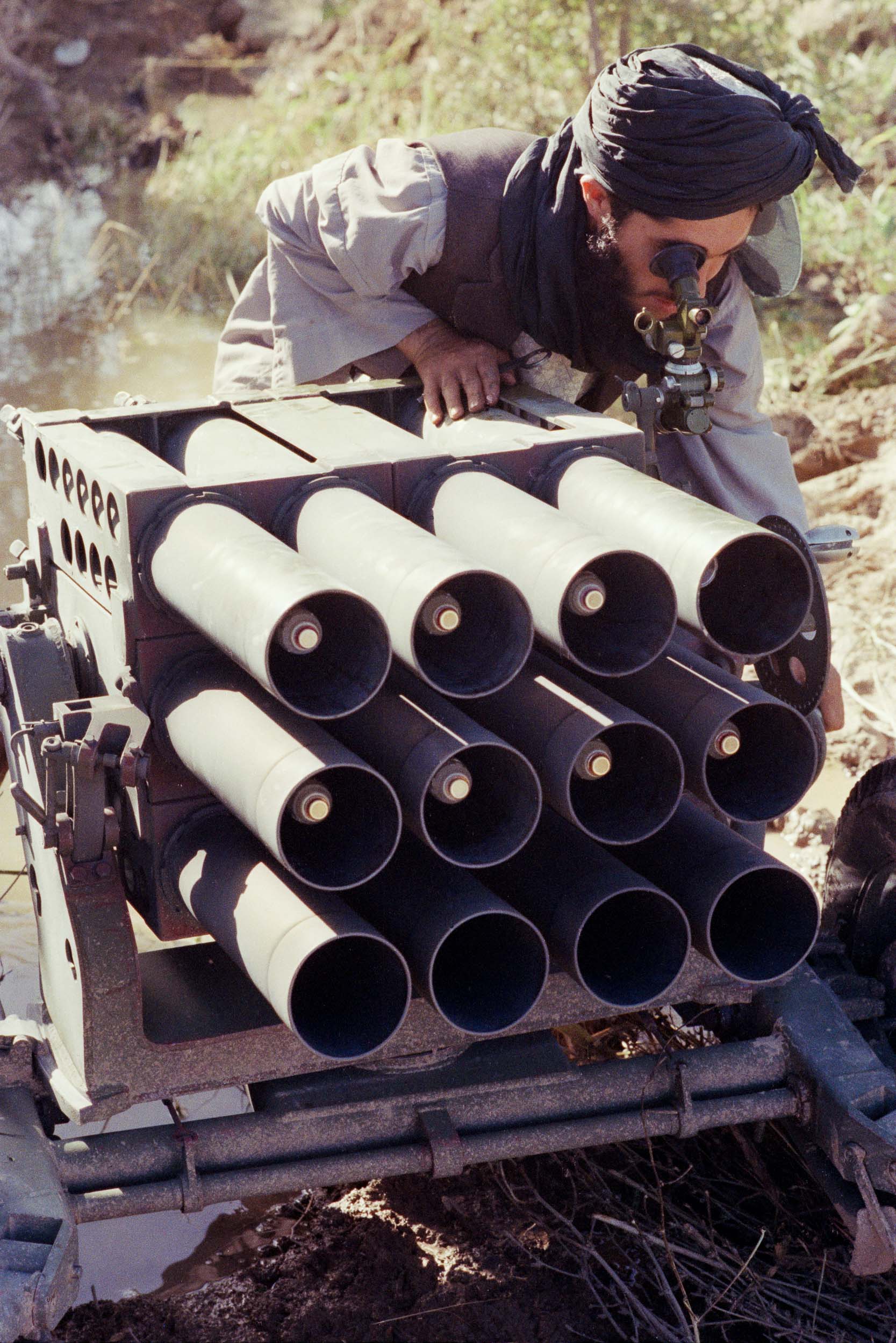  Mujahideen aim a Chinese made  rocket launcher towards a Russian government post,  Afghanistan 1988