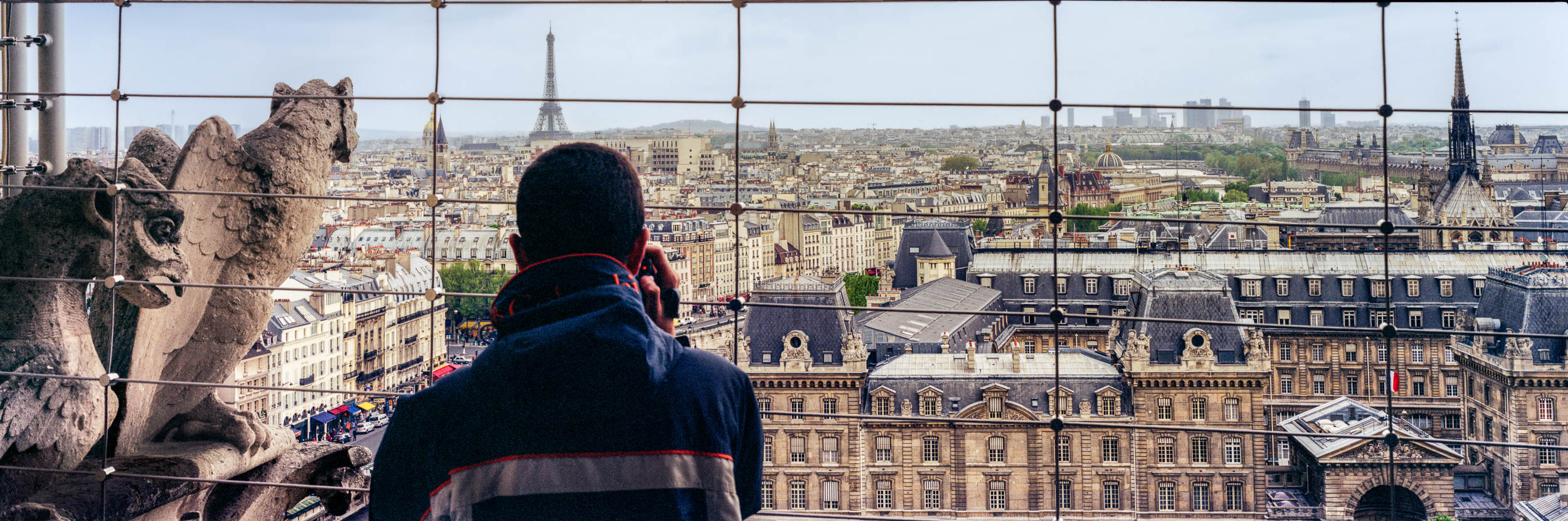 Tourist on top of Notre Dame, Paris