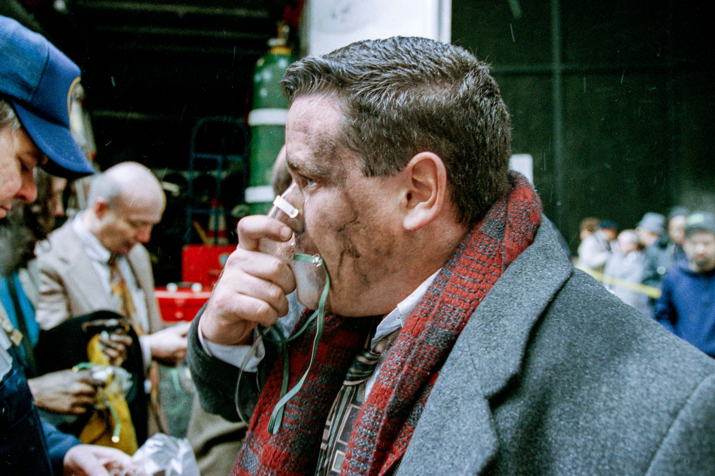 Office worker receiving  medical treatment outside of the World Trade Center, NY, 1993