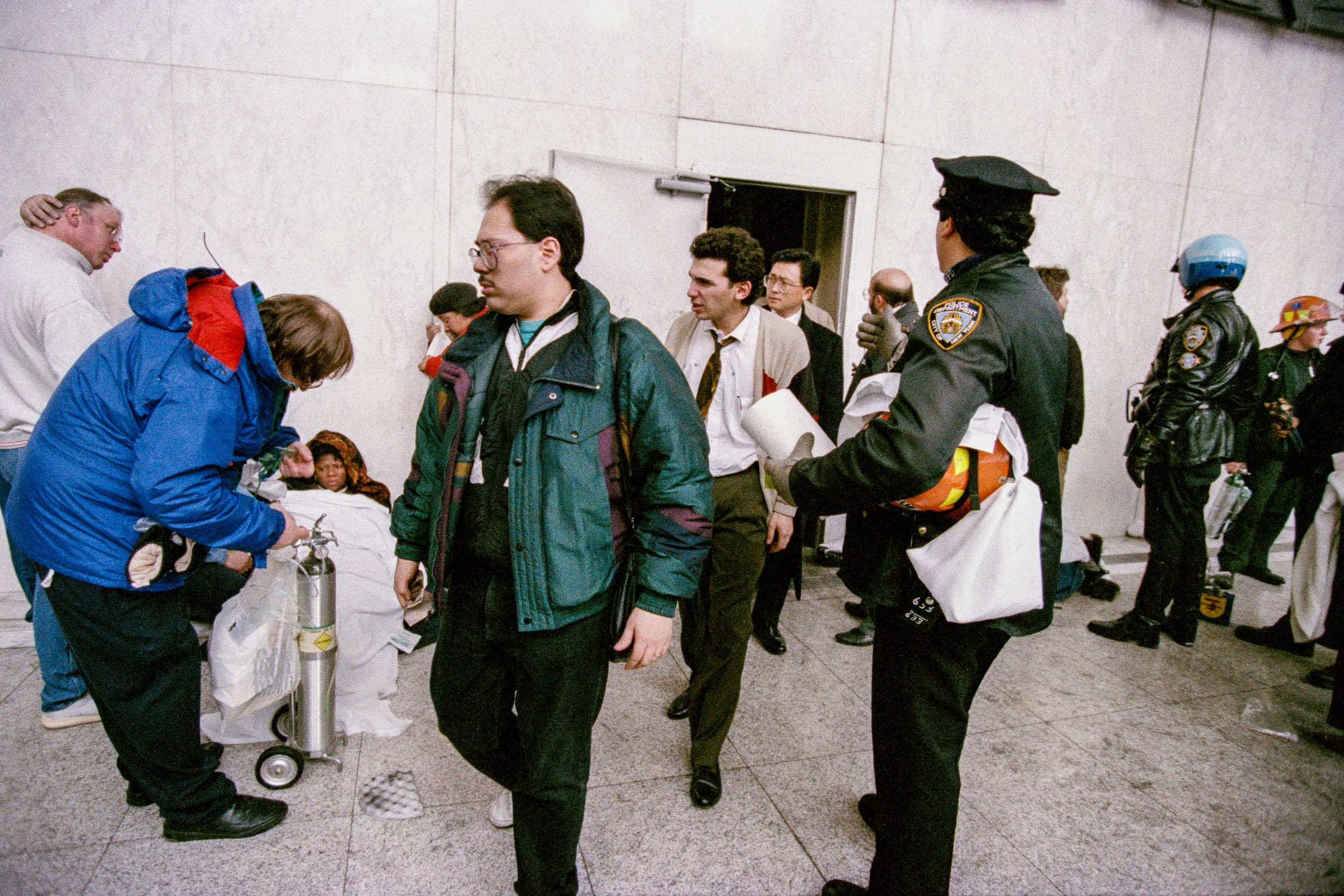 Office workers exiting the stairwell into the lobby of the World Trade Center, NY, 1993