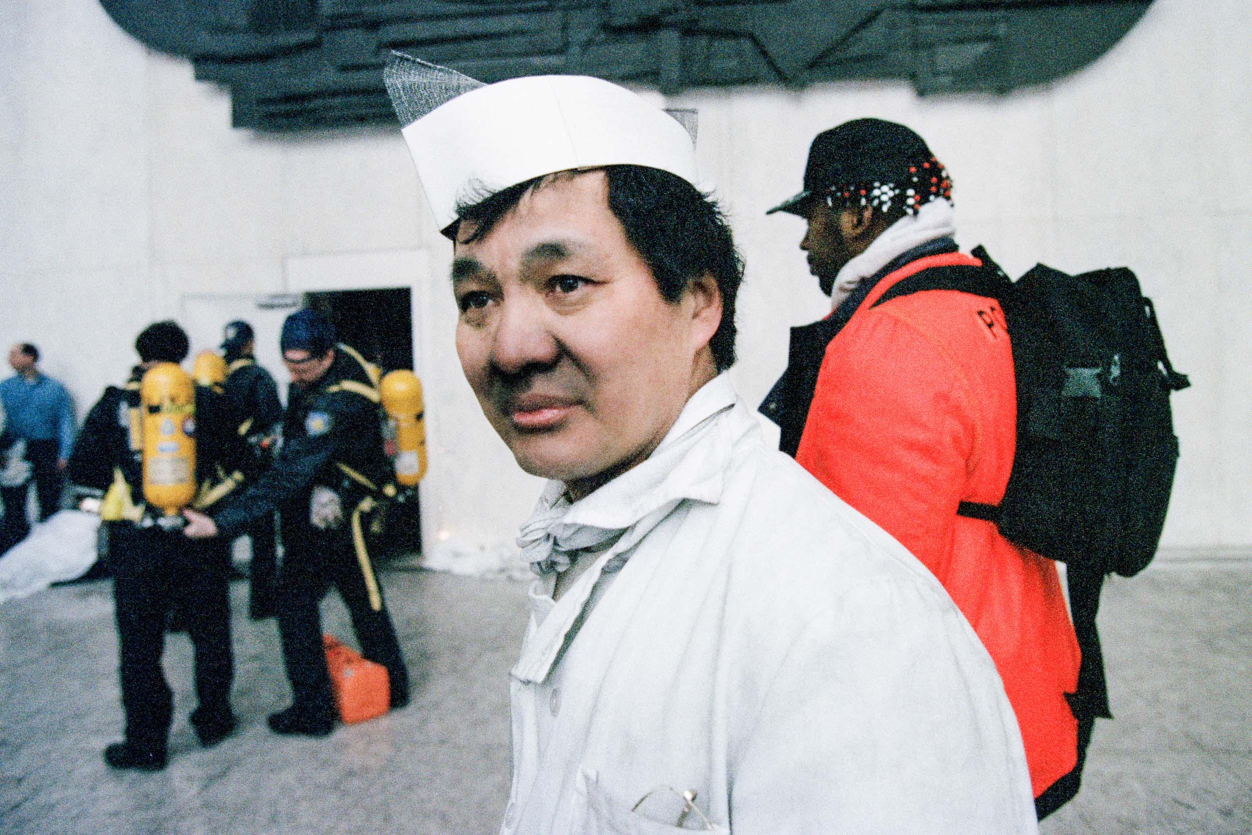 Restaurant worker after walking down the stairs to the lobby of the World Trade Center, NY, 1993