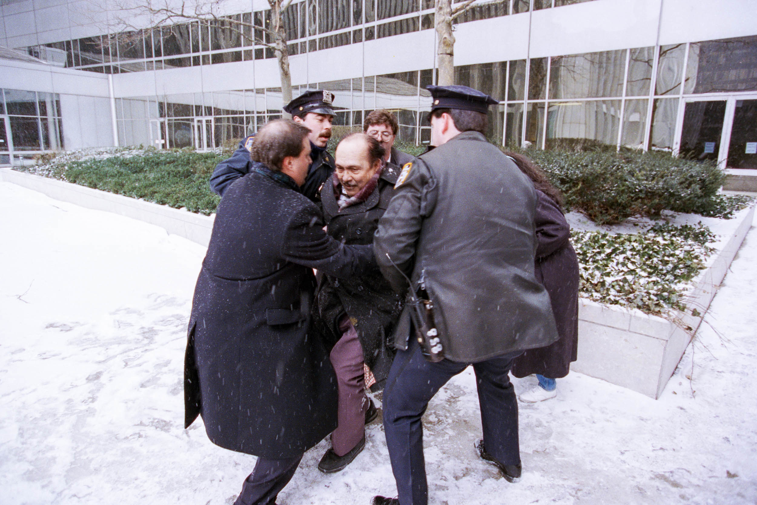 An office worker gets help getting back to his feet outside the World TradeCenter, NY, 1993