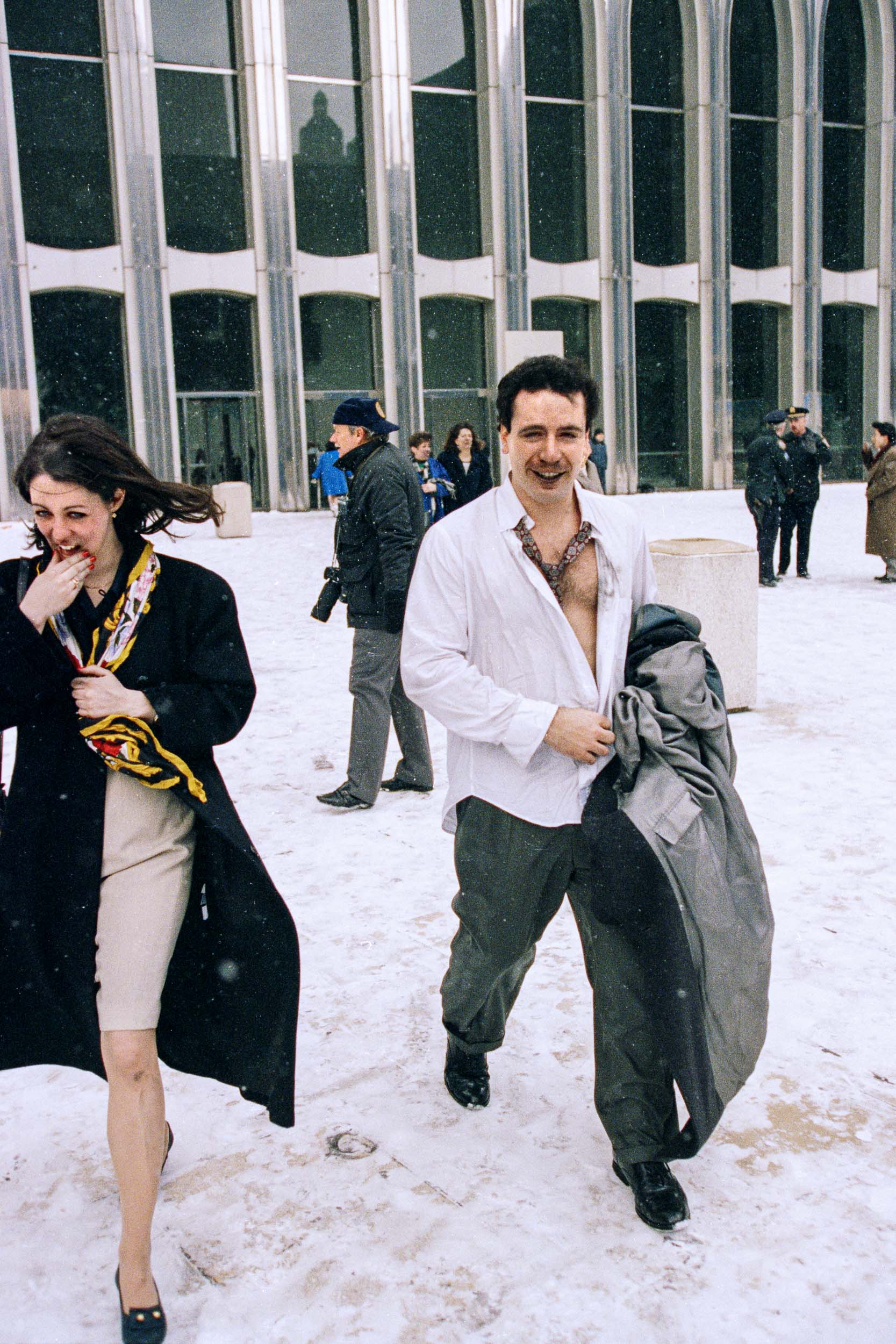 Happy to have survived the bombing,  office workers walk away from the World Trade Center, NY, 1993